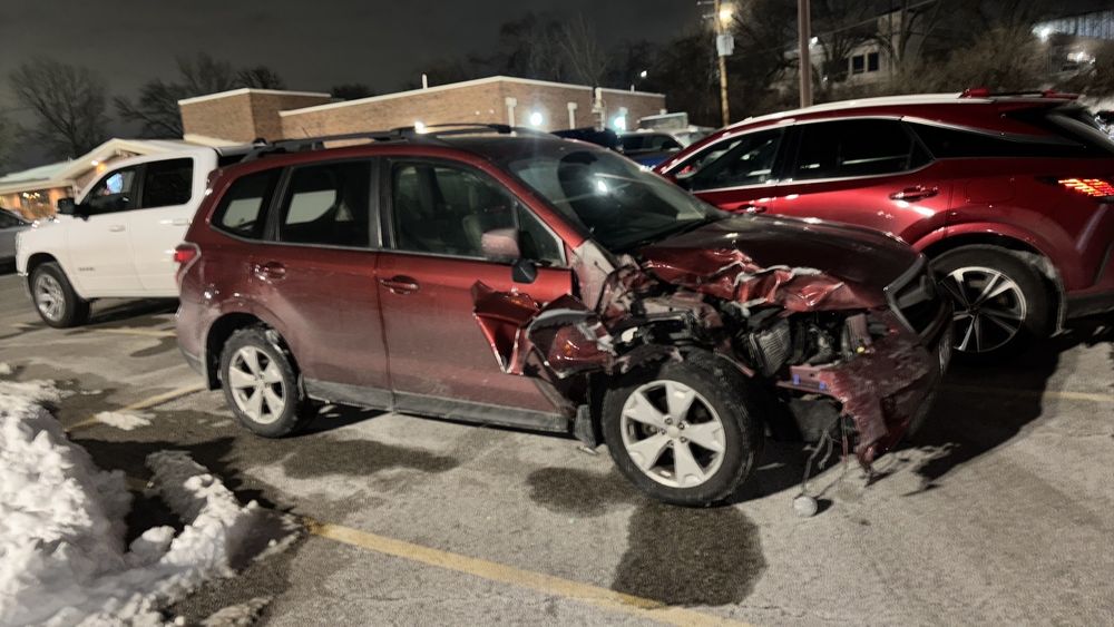 Front-end collision damage on a vehicle after an accident